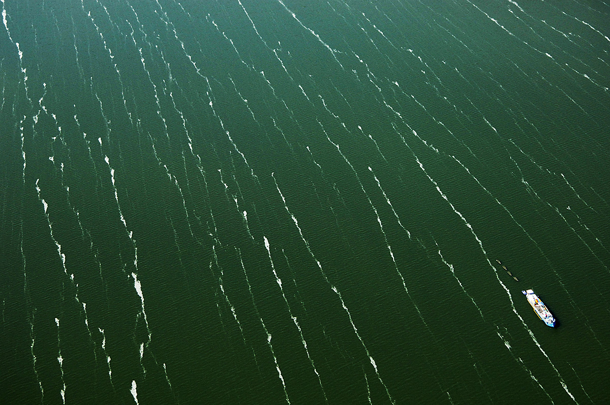 Aerial View of Sea Stripes with a Ship near Monnickendam, Netherlands.