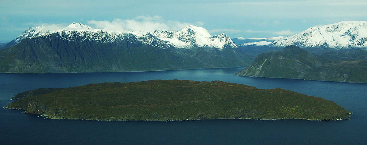Panoramic Aerial View of Island and Snowy Mountains between Alta and Tromsø, Norway.