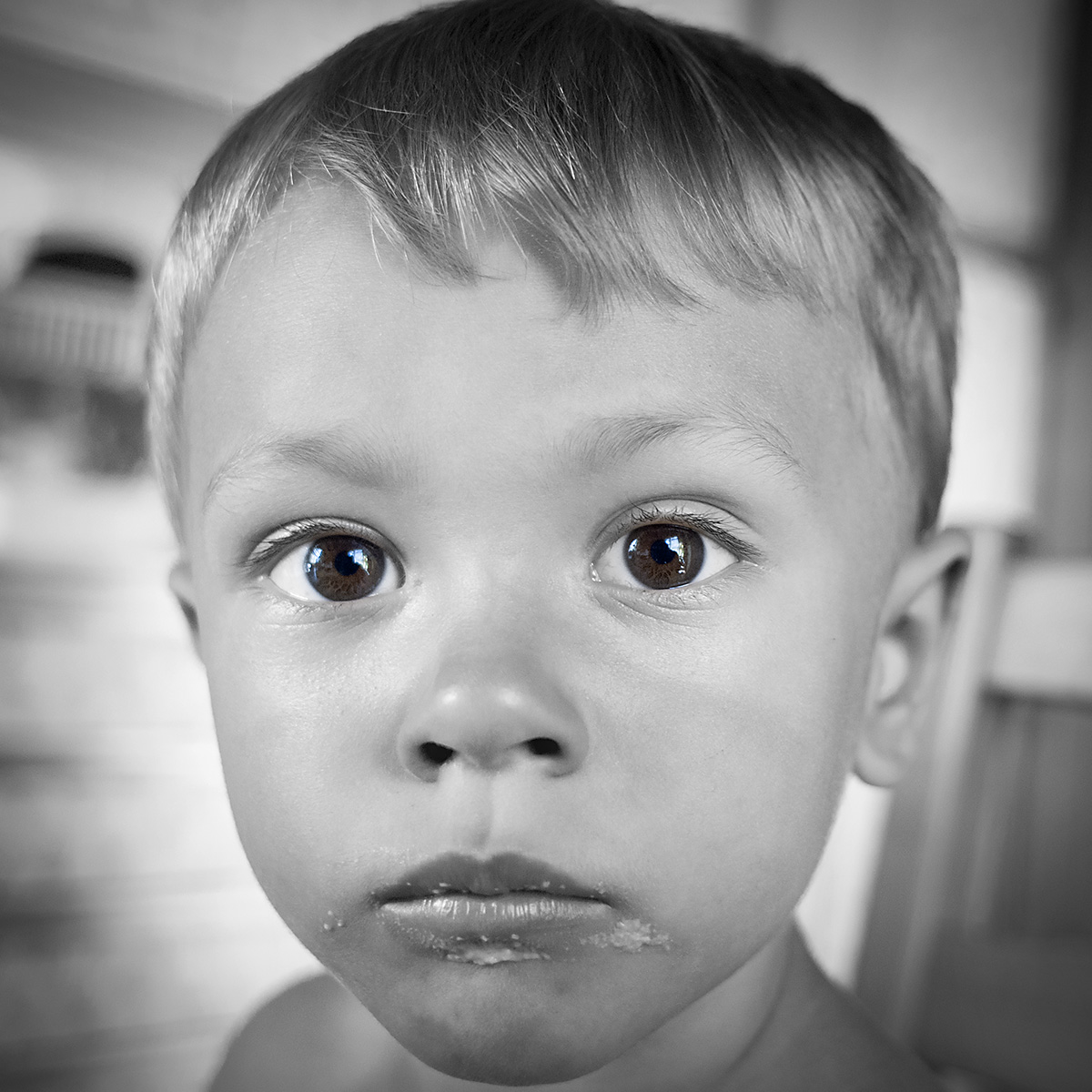 Danny, boy with bread crumbs
