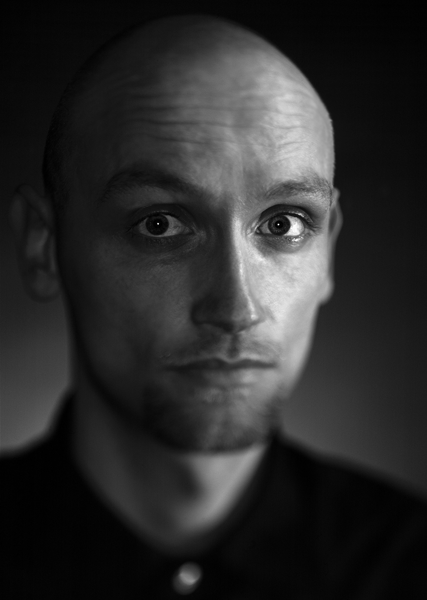Hans boy looking surprised and worried black and white large format portrait